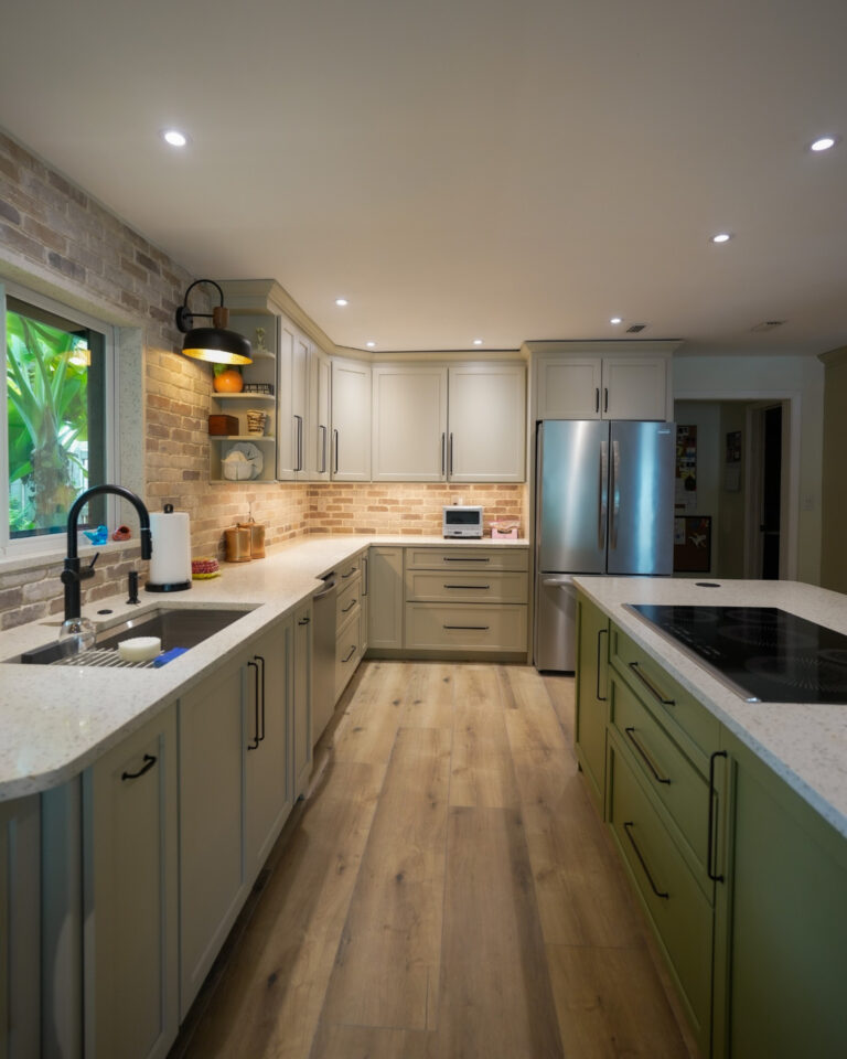 cream cabinets olive island kitchen