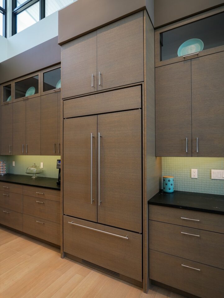 integrated walnut refrigerator cabinetry