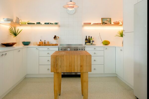 mid century white kitchen featured