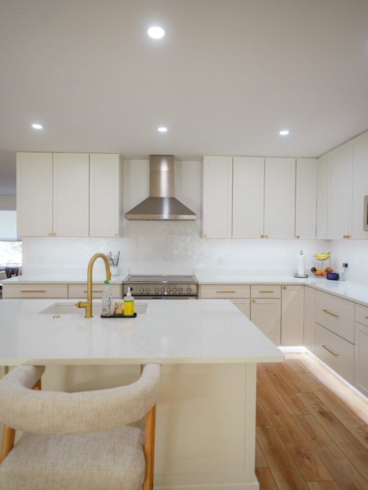 white quartz island herringbone backsplash